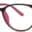 A pair of glasses is shown with pink frames.