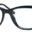 A pair of glasses is shown with the frame slightly bent.