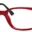 A pair of red glasses with black temples.