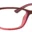 A pair of red glasses is shown.