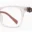 A pair of glasses with red accents on them.