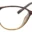 A pair of glasses is shown with the frame in focus.