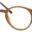 A pair of glasses is shown with the frame in focus.