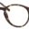 A pair of glasses is shown with the frame in focus.