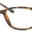 A pair of glasses is shown with orange speckles.