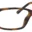 A pair of glasses is shown with no lens.